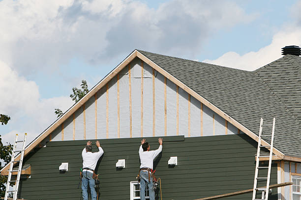 Professional Siding technician working in Union, KY